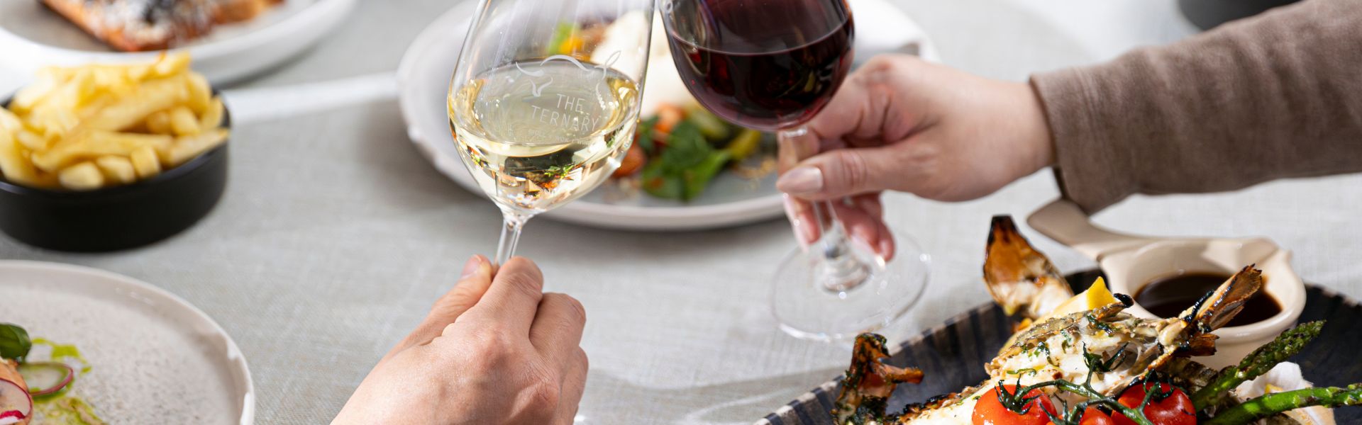 Dinner dishes and wine at The Ternary